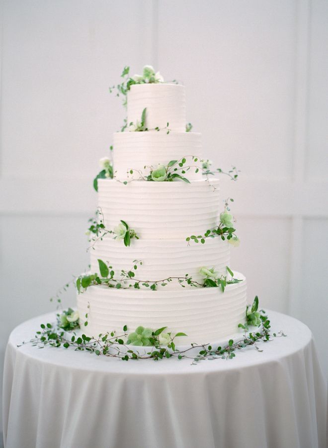 Wedding Cakes Five Tier White Wedding Cake Wrapped In Greenery